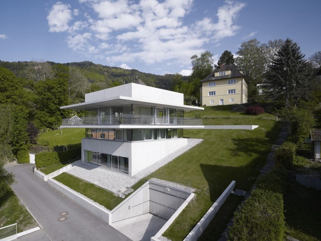 White Residential House in Sloped Land with Beautiful View in Austria